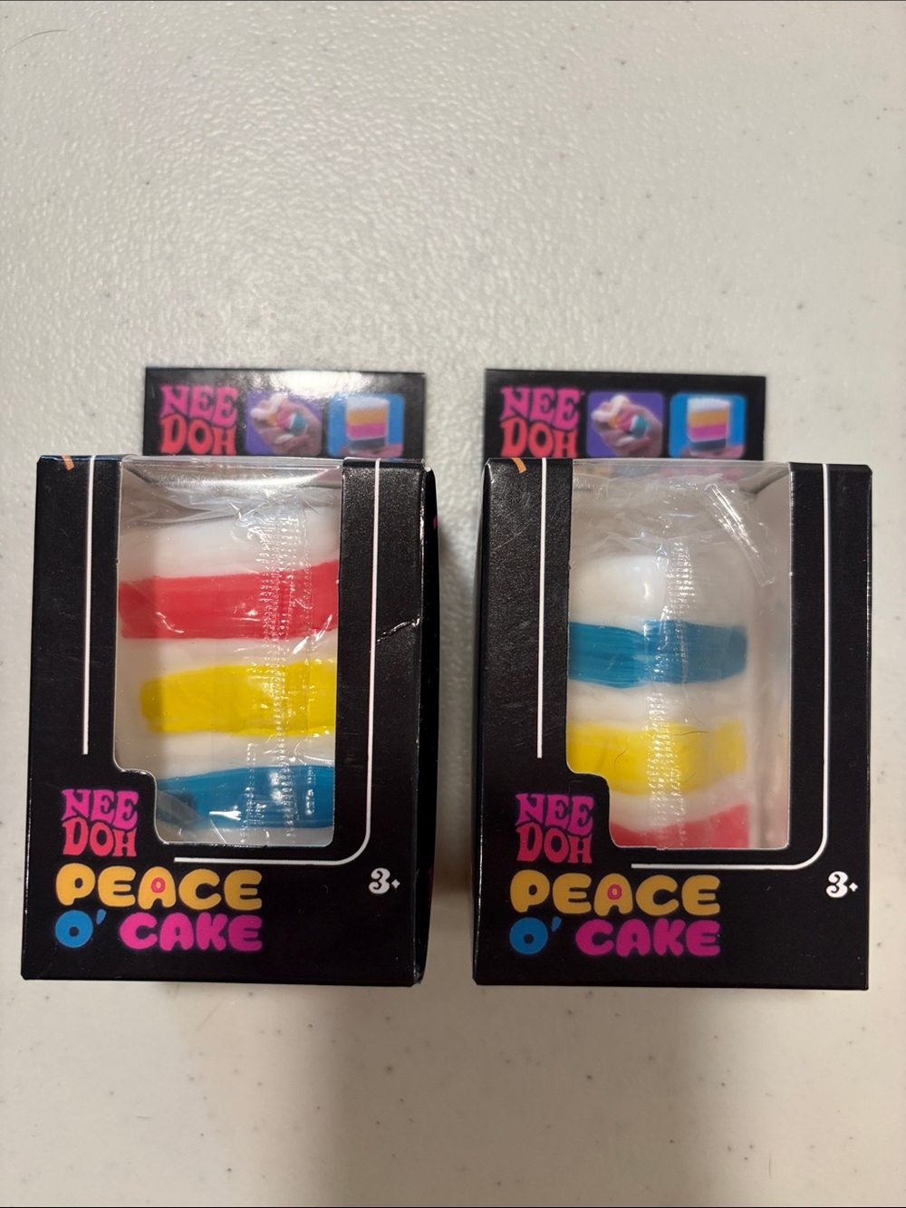 2 NIB Nee Doh Dupes - Peace O’ Cake